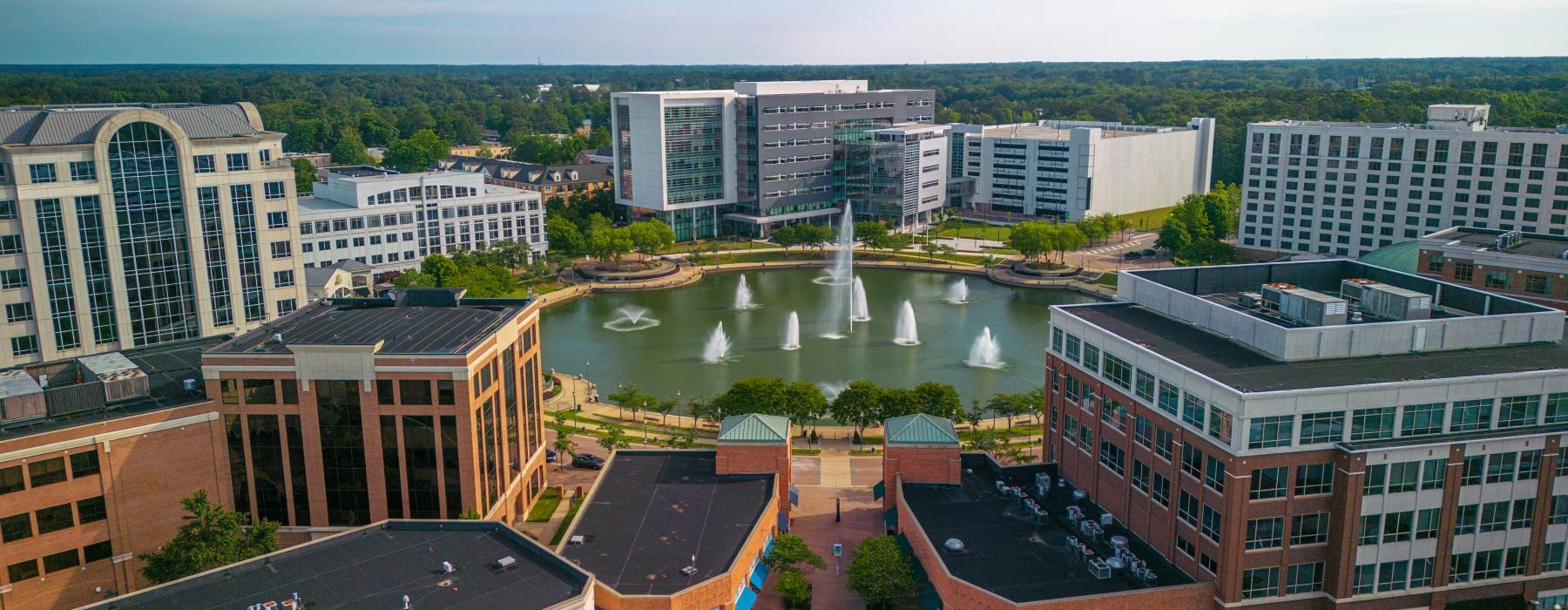 a city with a fountain in the middle